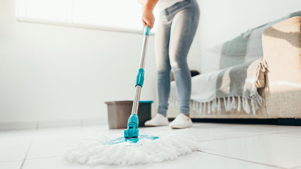 image of a cleaning professional - how much do home cleaning services cost